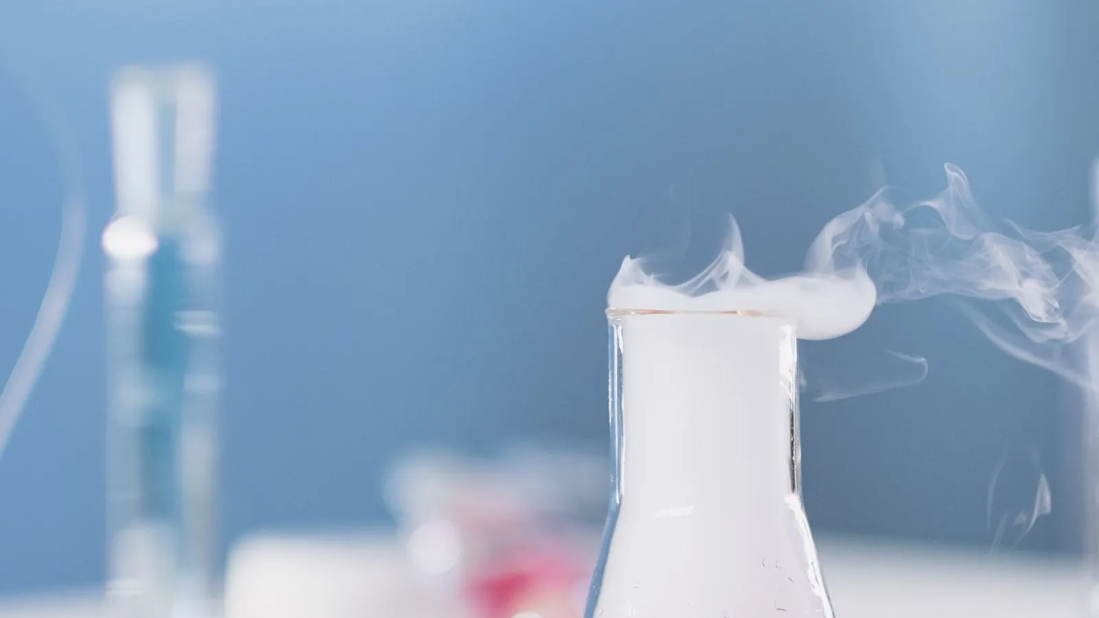 Laboratory chemical bottles, representing high-barrier liner compatibility.
