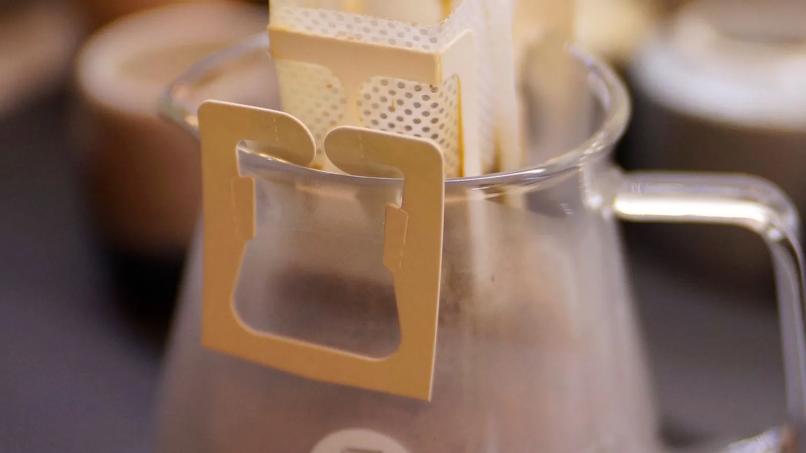 Coffee beans and pouch, representing one-way valve retrofit for coffee bags.