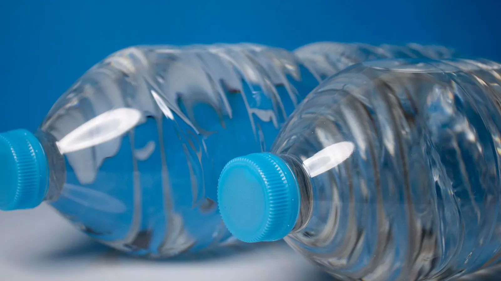 Close-up of a bottle cap, representing vented induction liner pressure management.