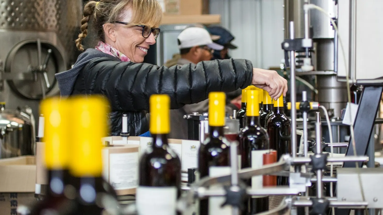 A packaged bottle being inspected for quality control before production approval.