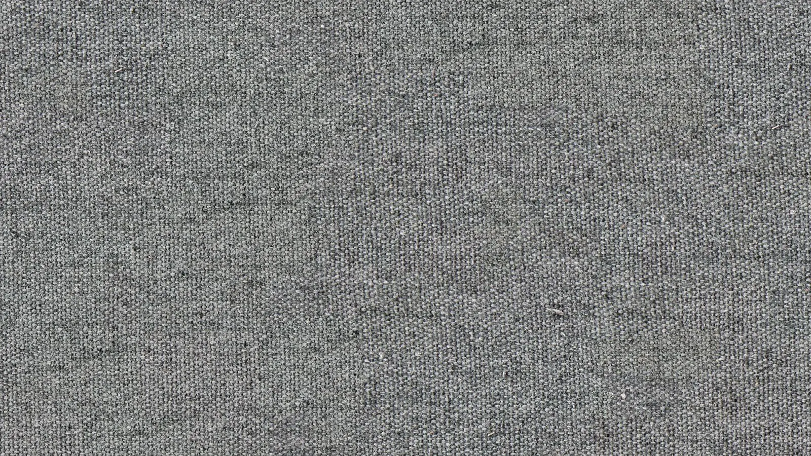 Textured sofa fabric, representing bouclé upholstery discoloration.