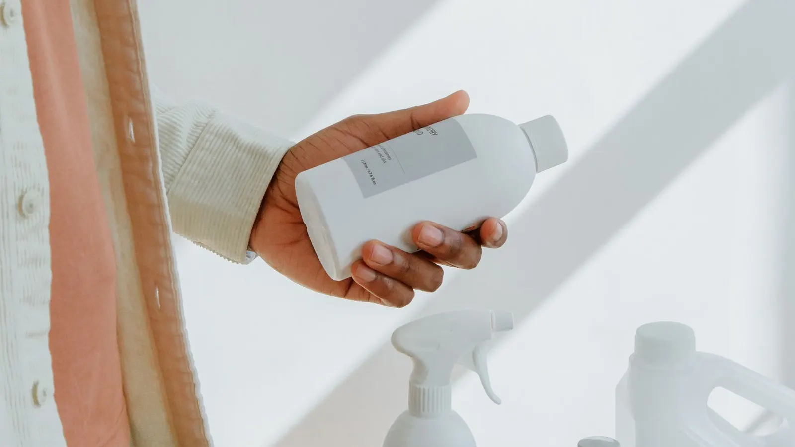 Cleaning spray bottle, representing spray-pattern testing.